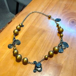 Gold bobble necklace with copper-brown leaves